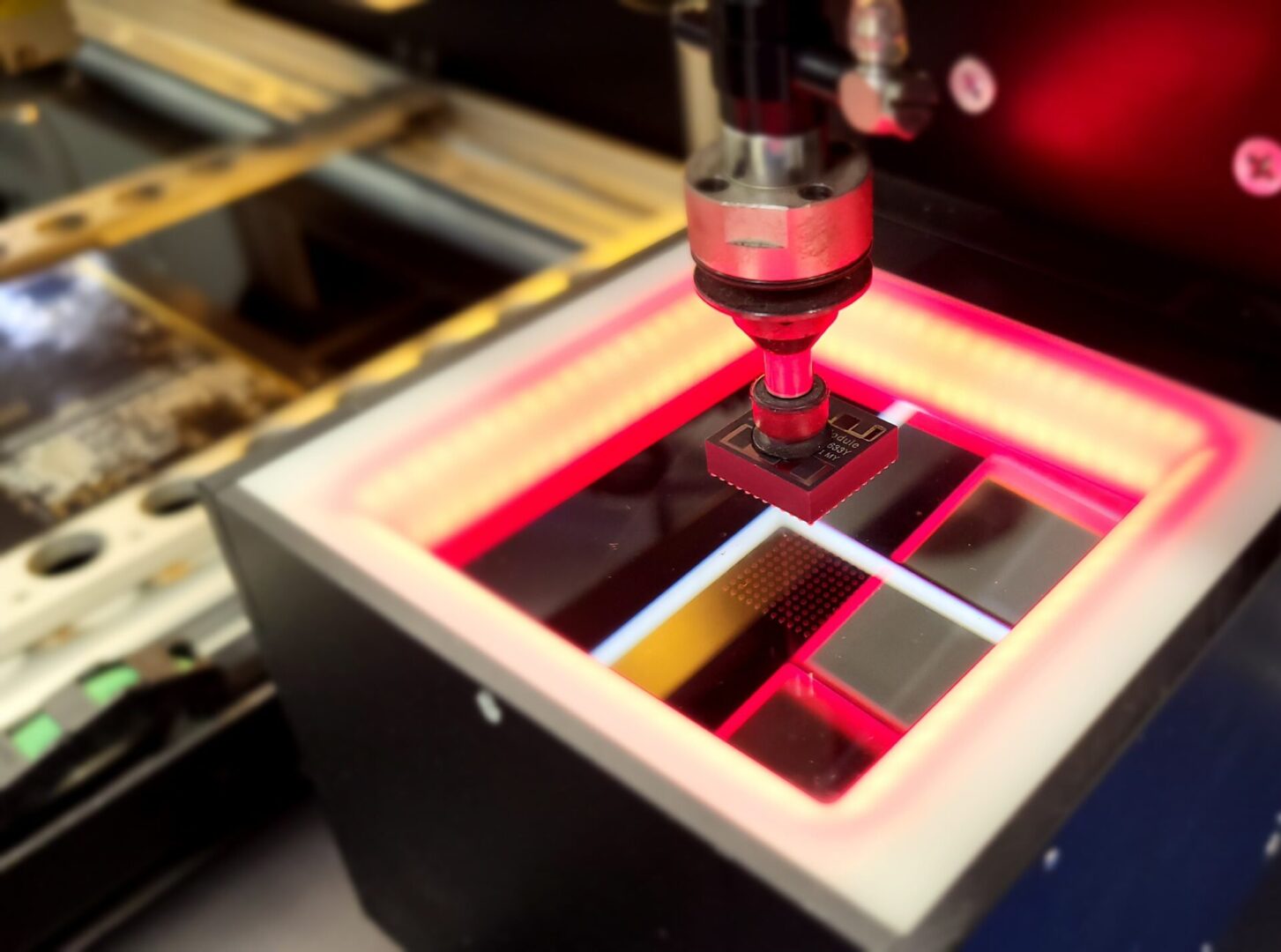 A glass being cut with a machine.